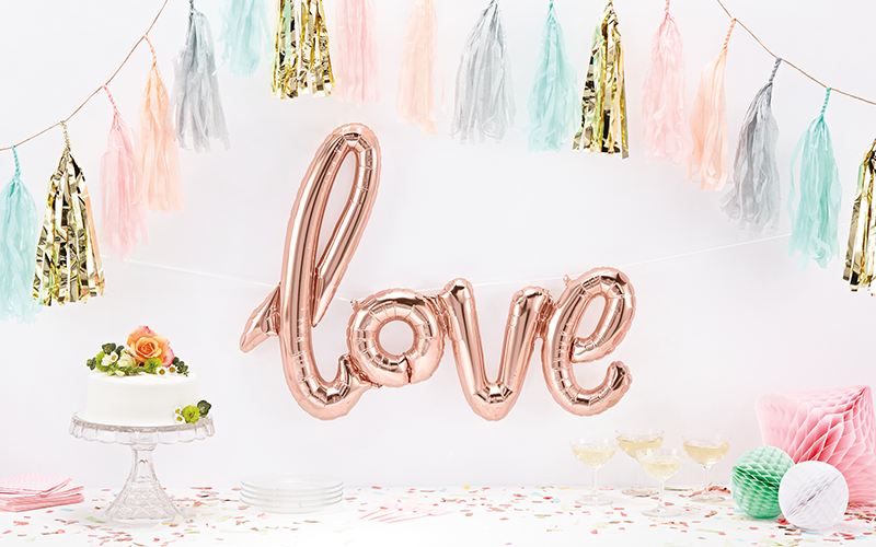 Script Foil Balloon Spells "Love" in Rose Gold
