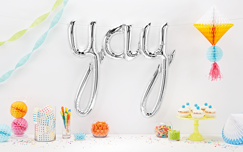 Script Foil Balloon Spells "Yay" in Silver
