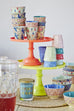 coral and yellow cake stands
