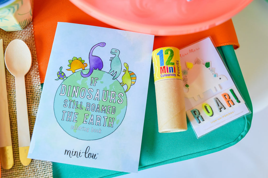 Dinosaur coloring book, coloring pencils and iron on patches.