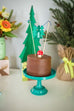green cake stand with cake